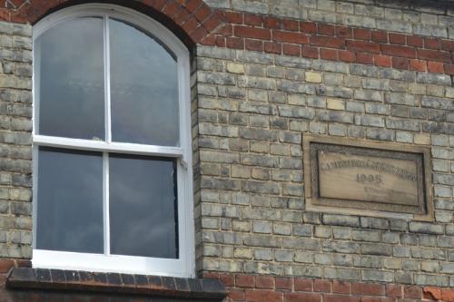 MRD-gatehouse-upper-window-and-stone-6-July-2015-SL